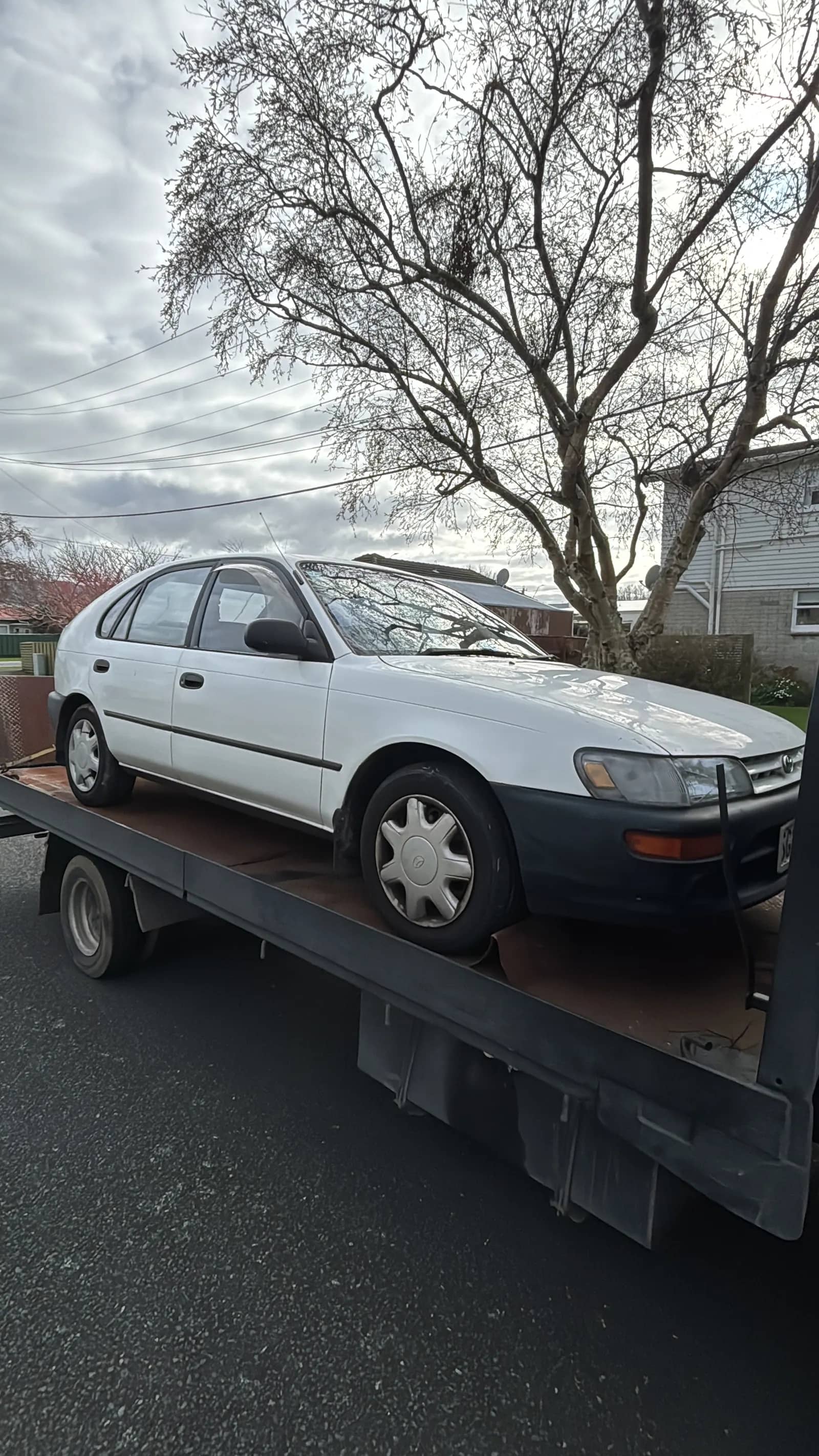 Unwanted car collected on the flatbed for cash